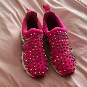 Multi colored studded hot pink fashion sneaker with red bottoms never worn